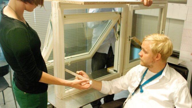 User and designer testing a window prototype